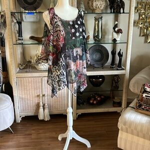 I have a sleeveless multi color top very beautiful